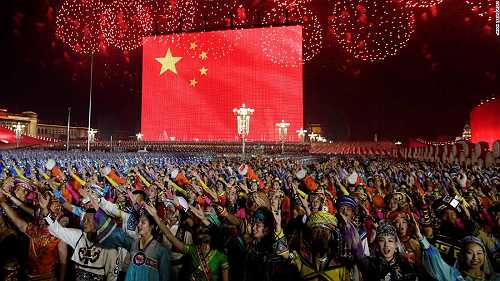 Hong Kong descended into chaos. In flag-covered Beijing, almost no one noticed
